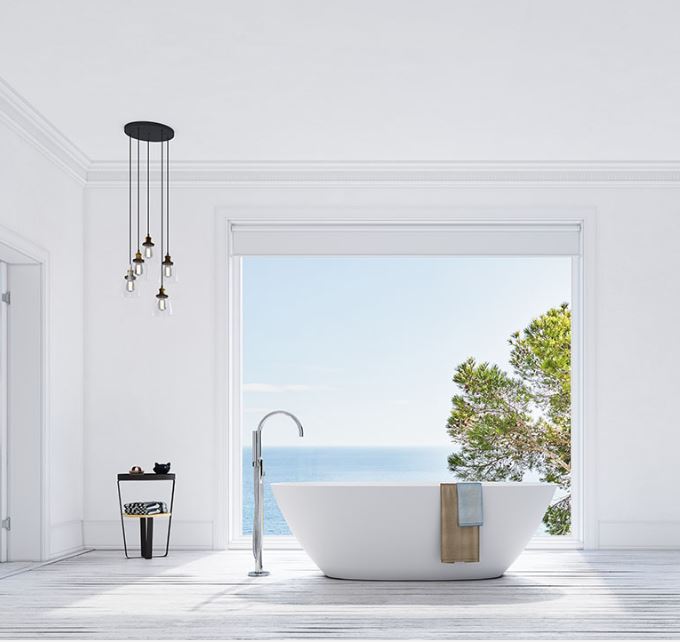 Bañera exenta SENSE de Solid Surface en blanco mate, diseño moderno con formas redondeadas. Medidas 177x80x56 cm.